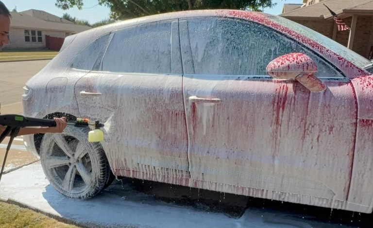 SUV covered in foam during mobile exterior wash service by Luna Car Wash & Detailing in the Dallas Fort Worth Metroplex